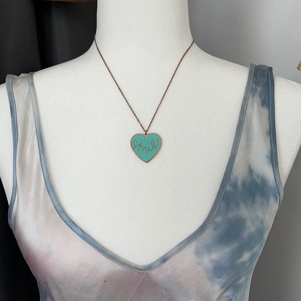 Light blue “smile” pendant necklace